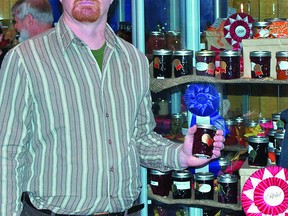 Robert Henderson, from Henderson Farms of Wolfe Island, received top honours as Grand Champion Jam and Jelly Maker, and won the Judges Choice Award for its Raspberry and Pear Jam at the 2012 Royal Agricultural Winter Fair in Toronto.     Contributed photo