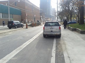 Tweeted pic of City of Toronto truck parked in a bike lane on Sherbourne St. Handout/QMI Agency