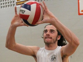 Connor Santoni, co-captain of the Regiopolis-Notre Dame senior boys volleyball team, practises in the Regi gym Tuesday afternoon for this week's OFSAA AAA boys volleyball championship. (Michael Lea/The Whig-Standard)