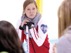 Two-time world junior curler Kaitlyn Lawes instructs Beaver Brae curlers at the Keewatin Curling Club Tuesday, Nov. 20, 2012.
