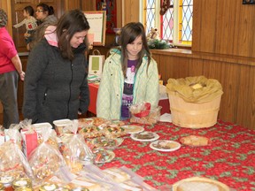 Kim Farrish and her daughter Rory Parish were two of the early shoppers at A Taste of Christmas, hosted by the Lucknow Presbyterian Church on Nov. 17, 2012. In addition to the heavy laden bake tables, shoppers enjoyed a delicious soup, sandwich and dessert. (SUBMITTED)