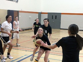 Fort Sting senior girl's basketball player Brooke Herr lines up a shot during a recent practice session. The team will kickoff their season with a game against the team's alumni of Friday evening.