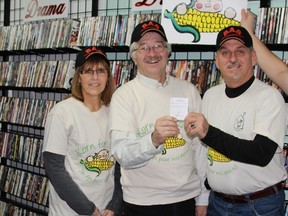 Francine Porter, volunteer, Father Remi Lessard, Reynald Brisson, Founder and CEO of Korn for Kids all gathered for the 'Funny Playhouse' draw on November 15.