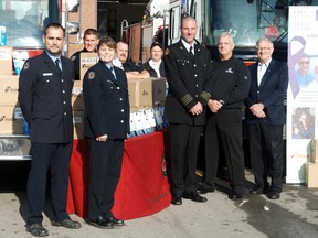 The Hawkins-Gignac Foundation donated 300 CO detectors to the Woodstock Fire Department Thursday, Nov. 22, 2012.