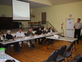 Deputy-treasurer Mike Humble, right, presents the proposed 2013 Meaford budget at a public meeting in Woodford Wednesday.