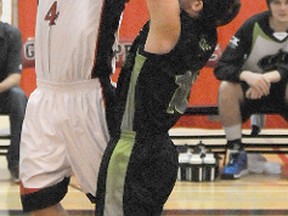 TERRY FARRELL/DAILY HERALD-TRIBUNE
Wolves forward Jamison Plett goes up for a basket against Red Deer defender Jacob Cusumano during GPRC’s last home weekend. Both Wolves hoops teams are at home again this weekend, for a series against The King’s University College Eagles.