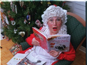 Mrs. Claus catches up on some Christmas recipes. The Brantford Public Library has hundreds of cookbooks to help with your holiday meals.