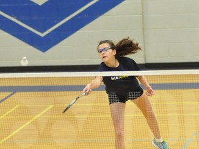 Dozens of badminton players are at Timmins High & Vocational School for a two-day tournament. Doubles competition kicks off Saturday at 9 a.m. École secondaire catholique Thériault player Anne Boulanger reaches for the shuttlecock on Friday.