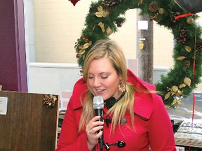 Drive show announcer Christina Ray, with High River’s Sun Country 99.7 FM, was in Vulcan Friday, Nov. 23 to promote the Town’s inaugural Black Friday event. Here, she is pictured at Floors First speaking live on the radio.
Depending on how well the sale event works out for local businesses, Black Friday in Vulcan could become annual.
Simon Ducatel Vulcan Advocate