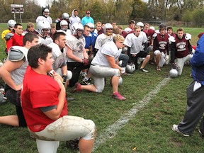 Frontenac Falcons coach Mike Doyle talks with his players during a practice on Nov. 1. The Falcons will meet St. Joan of Arc Knights of Barrie in the National Capital Bowl final on Tuesday at the Rogers Centre in Toronto. (Michael Lea/The Whig-Standard)