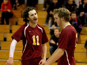 Regiopolis-Notre Dame Panthers Connor Santoni, left, and Jacob Gordanier celebrate a point during a quarter-final match against St. Thomas of Villanova Wildcats at Holy Cross Secondary School during the Ontario Federation of School Athletic Associations senior boys AAA volleyball championship on Friday. The Panthers won the match 3-1 to advance to Saturday morning’s semifinal round. (Ian MacAlpine/The Whig-Standard)