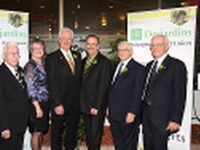 Onesime Tremblay, left, past board chairman of Desjardins Voyageurs Credit Union, Carole Kairovicius, board chair of Desjardins Voyageurs Credit Union, Guy Brunelle, past board chairman of Desjardins, Jean-Marc Spencer, executive director of Desjardins, Louis Paquette, founder and past board chairman of Desjardins, and Michel Fredette, a former general manager of Desjardins, were on hand for 70th anniversary celebrations of Desjardins Voyageurs Credit Union in Sudbury, ON. on Friday, November 23, 2012. JOHN LAPPA/THE SUDBURY STAR/QMI AGENCY
