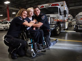 Paramedics Rosemary Bentley and Matthew DiMonte got a chance to meet Anderson Bihler at the paramedic headquarters in Ottawa on Sunday. Anderson and his mom Shelley Black wanted to meet the paramedics who saved Anderson's life after he suffered a stroke in June. (Tony Caldwell/Ottawa Sun)