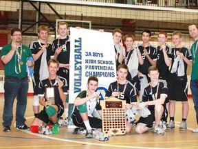Photo courtesy Shelley Lauzé
The St. Joseph Celtics won the Alberta Schools Athletic Association 3A boys volleyball championship banner on Saturday in Whitecourt, beating Edmonton’s Louis St. Laurent Barons 25-23, 25-23 in the gold-medal match. It is the school’s first-ever provincial boys volleyball championship. Pictured with their medals and the hardware are: Back row (from left) – head coach Todd Best, Dalyn Lauzé, Michael Cepuch, Brock Penson, Mitch Best, Devin Lambert, Talon Durrant, Christian Demmelbauer, assistant coach Kevin Maclean; front row (from left) – Jarrett Ruschkowski, Sean Douglas, Ryan Fogle, Aidan Williams.