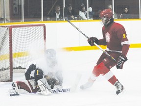 Pembroke Bantam King Jason Levesque (6) kicks up a cloud of spray in the face of RWC Crusader netminder Connor Brown  during the Bantam B quarter finals in the Pembroke Regional Silver Stick held Nov. 25, 2012 at the Pembroke and Area Community Centre. The Kings would be beaten 6-0. For more community photos, please visit our website photo gallery at www.thedailyobserver.ca.