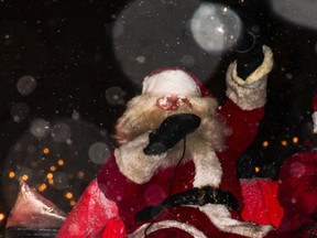 Seen through a kaleidoscope of snowflakes, Santa Claus himself greeted Kirkland Lakers Friday evening during the parade.