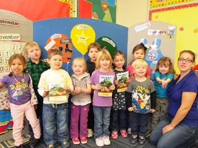 White Fox pre-school present their cook book.