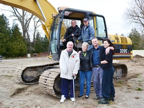 The first step of construction for The Edinburgh Club is underway. On a windy and cold Nov. 22, the Hill family and Mayor Mike Smith gathered at the site in support of Andrew Hill, project manager and developer as he started to excavate and set  foundation for the club. Pictured back (left to right) Mayor Mike Smith, Andrew Hill. Front (left to right) Terry Hill, Marian Hill, Anthony Hill of Davidson-Hill Elevators Inc. and Melissa Hill.