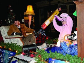 Dave Hudson, Aidan Whalen, and the rest of the cast of A Christmas Story during Kingston's Nighttime Santa Claus Parade.     Contributed photo