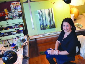 Local painter Michelle Reid, transforms her Portsmouth Village home into an artisan studio for the Hatter Craft Fair Saturday and Sunday, Dec. 1-2.