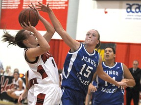 Wolves guard Kelly O’Hallahan battles through the defending of Eagle Tamara Deunk. The Grande Prairie Regional College Wolves hosted King’s University Colleges Eagles of Edmonton in Alberta Colleges Athletic Conference women’s basketball action Friday. The Eagles won 67-51, outscoring the Wolves 19-2 in the final seven minutes. (Terry Farrell/Daily Herald-Tribune)