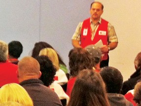 Cornwall’s Don Daugherty leads an orientation session for Red Cross volunteers in the aftermath of Hurricane Sandy in New York City.