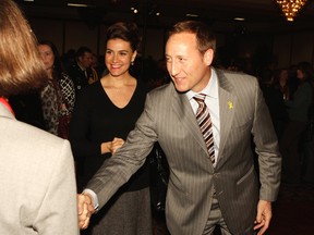 Minister of National Defence Peter MacKay and his wife Nazanin Afshin-Jam greet delegates Monday night at the opening of this week's Canadian Institute for Military and Veteran Health Research's third annual forum on military health in Kingston.
Elliot Ferguson The Whig-Standard