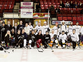 Fourth-year Bachelor of Physical and Health Education students pose with Nipissing University faculty during the Paul Nelson Memorial Hockey Game, which raised nearly $900.