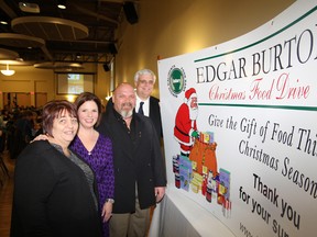Sharon Burton, left, wife of the late Edgar Burton, Angie Robson, of Vale, Rick Bertrand, then president of United Steelworkers Local 6500, and Geoffrey Lougheed, chairman of the Sudbury Food Bank, were on hand for a celebration dinner of the 25th anniversary of the Edgar Burton Christmas Food Drive at the Steelworkers hall in Sudbury, ON. on Friday, November 23, 2012. Local 6500 hosted the dinner. JOHN LAPPA/THE SUDBURY STAR/QMI AGENCY