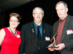 Luke Janmaat accepts the Chairman’s award for Leadership from HMA Chairman Frank Palen at the HMA awards.