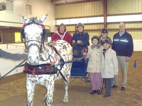 The riding program at the Pegasus Riding Association Nurturing Challenged Equestrians in Port Elgin has been a huge success thanks to government funding. For the past ten weeks, seniors from Elgin Lodge retirement home have enjoyed the program which sees them drive a cart and horse around the facility's arena as well as socialize over lunch. MP Huron Bruce, Ben Lobb stopped in at PRANCE Nov. 17 to see how the money was being spent as well as listen in on the riding association's annual general meeting. Pictured with Dudley, one of PRANCE's most famous and well-liked horses following their tenth class are: in no particular order, Gladys Sollory,Doug Stevens, supervisor, Liz Ritchie, Don Cochrane, Margaret Mckillop, PRANCE executive director Fran Lavelle and Ben Lobb.