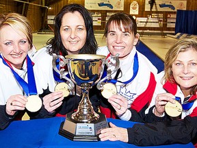 From left, Caroline Deans, Sheri-Lynn Collyer, Kendra Lafleur and Lynn Stapley with the Dominion Insurance Trophy. (Dominion photo.)