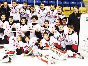 The Duvanco Homes minor bantam Quinte AAA Red Devils celebrate their tournament title at the Whitby Silver Stick. (Photo submitted.)