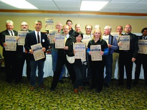 Members of the Portage Rotary Club pictured with food drive bags. The annual Portage Rotary & Daily Graphic Food Drive Bags are arriving in your mailboxes. Fill them with non-perishable food items or new, unwrapped toys and take to any of the six co-sponsoring businesses highlighted on the bags, bring to the fire hall, Jingle Bell Breakfast or to the Parade of Lights. (SUBMITTED PHOTO)