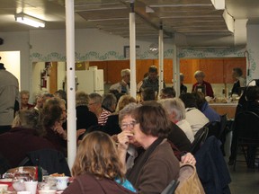Guests enjoy tea and sandwiches at the St. Paul’s United Church Tea, Bake Sale and Bazaar on Saturday, Nov. 24, 2012. The event was organized by United Church Women. (Simon Arseneau/Fairview Post)