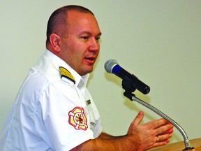 Champion Fire Chief Rolland Vienneau addresses a crowd of about 80 people during the Champion Fire Department’s annual roast supper fundraiser on Nov. 24 at the village’s community hall. About 80 people attended, and roughly $4,500 was raised for the fire department. Simon Ducatel Vulcan Advocate