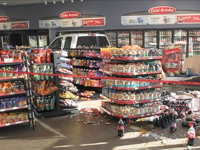 A truck still sits inside the PetroCanada convenience store in a truck stop on Gardiners Road at Highway 401 Tuesday morning after crashing through the front window and wall. No one was injured.
Michael Lea The Whig-Standard