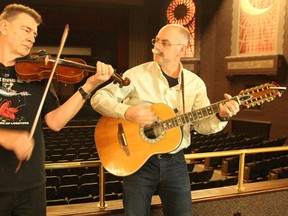 Mel Felhaber, left, and Art Henry, two members of local band Lobster Porsche Naughty Bits, entertained as organizers of the Lions CTV Children's Christmas Telethon announced its entertainment lineup for Saturday's event. (Brandi Cramer The Nugget)