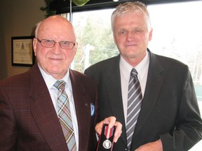 Wally Anderson (left) of Simcoe was presented with a Queen Elizabeth II Diamond Jubilee Medal by MPP Toby Barrett on Monday during a Simcoe Rotary Club meeting.  (DANIEL R. PEARCE  Simcoe Reformer)