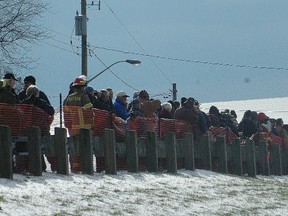 Crowds lined up shoulder-to-shoulder Tuesday in Port Burwell to see the off-loading of HMCS Ojibwa.