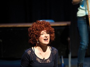 Aleisha Reimer, one of two double-casted actresses playing Annie during the Bert Church High School Players rendition of Annie, which runs at the Bert Church Theatre from Dec. 6-8, rehearses at the theatre on Saturday. Tickets to the public show are $7 online. JAMES EMERY/AIRDRIE ECHO