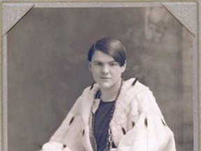 On loan to museum
The photograph on loan from the LíHirondelle family shows Julia L'Hirondelle wearing the ermine cape and holding the muff and hat in her lap, which were fur pieces given her in the early 1920s by husband Auguste LíHirondelle, a Slave Lake fur trader.