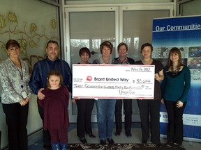 Sharon Johnston, left, Roy Sonley, Samantha Sonley, Deb Dillabough
Tracie Ross, Cathy Petrucci and Jenha Martin of Union Gas present Cheryl Stornelli of Brant United Way with a cheque for $30,674 towards the fall campaign. SUBMITTED PHOTO