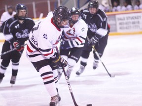 KEVIN RUSHWORTH PHOTO. Midget Huskies on the attack against the Taber Oil Kings.