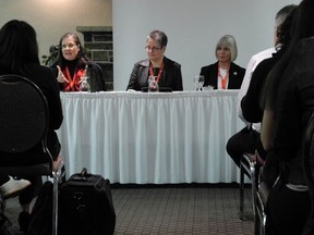 Researcher Shelley MacDermid Wadsworth, left, joins military spouses Josee Damboise, centre, and Leslie Natynczyk on a panel discussing the state of military families Wednesday in Kingston.
Elliot Ferguson The Whig-Standard