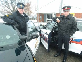 SCOTT WISHART The Beacon Herald
Perth County OPP Staff Sgt. Joel Skelding, left, and Stratford Police Insp. Sam Theocharis jointly launched the local holiday season RIDE program Wednesday in Sebringville.