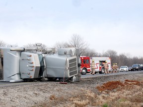 A tractor trailer lost control and rolled on its side Thursday morning on Highway 401 just west of Iona Road in the westbound lanes. The truck spilled its load and blocked both westbound lanes backing up traffric. Dutton/Dunwich Fire Department and Elgin OPP were on scene. (PATRICK BRENNAN, The Chronicle)
