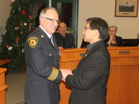 Stony Plain Fire Chief Dan Badry receives the Queen Elizabeth II Diamond Jubilee award this past Monday. Council also unanimously accepted the department’s Operational Implementation Report.