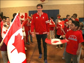 Olympic marathoner Dylan Wykes found a red and white welcome waiting for him Thursday afternoon when he paid a visit to Central Public School to talk about his Olympic experience.
Michael Lea The Whig-Standard
