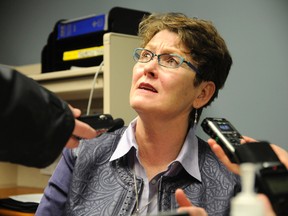 Stroke patient Marjorie Steeves speaks to media during a conference at Queen Elizabeth II Hospital Thursday. Steeves suffered a stroke in April and says she is pleased that AHS has set up a peer support network, called Living With Stroke, which will launch in January. (Adam Jackson/Daily Herald-Tribune)